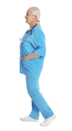 Photo of Full length portrait of mature doctor on white background