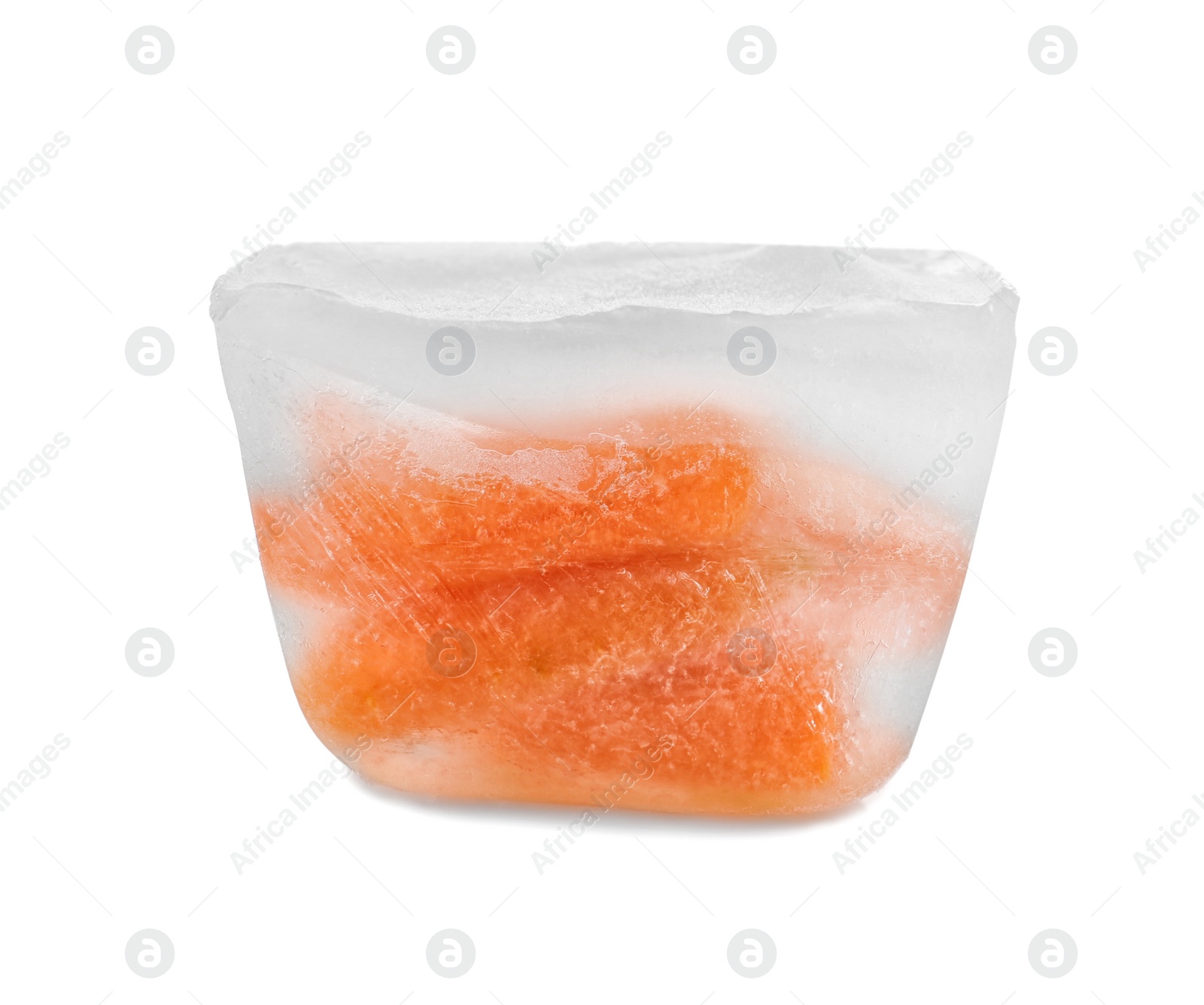 Photo of Fresh carrot in ice cube on white background. Frozen vegetables