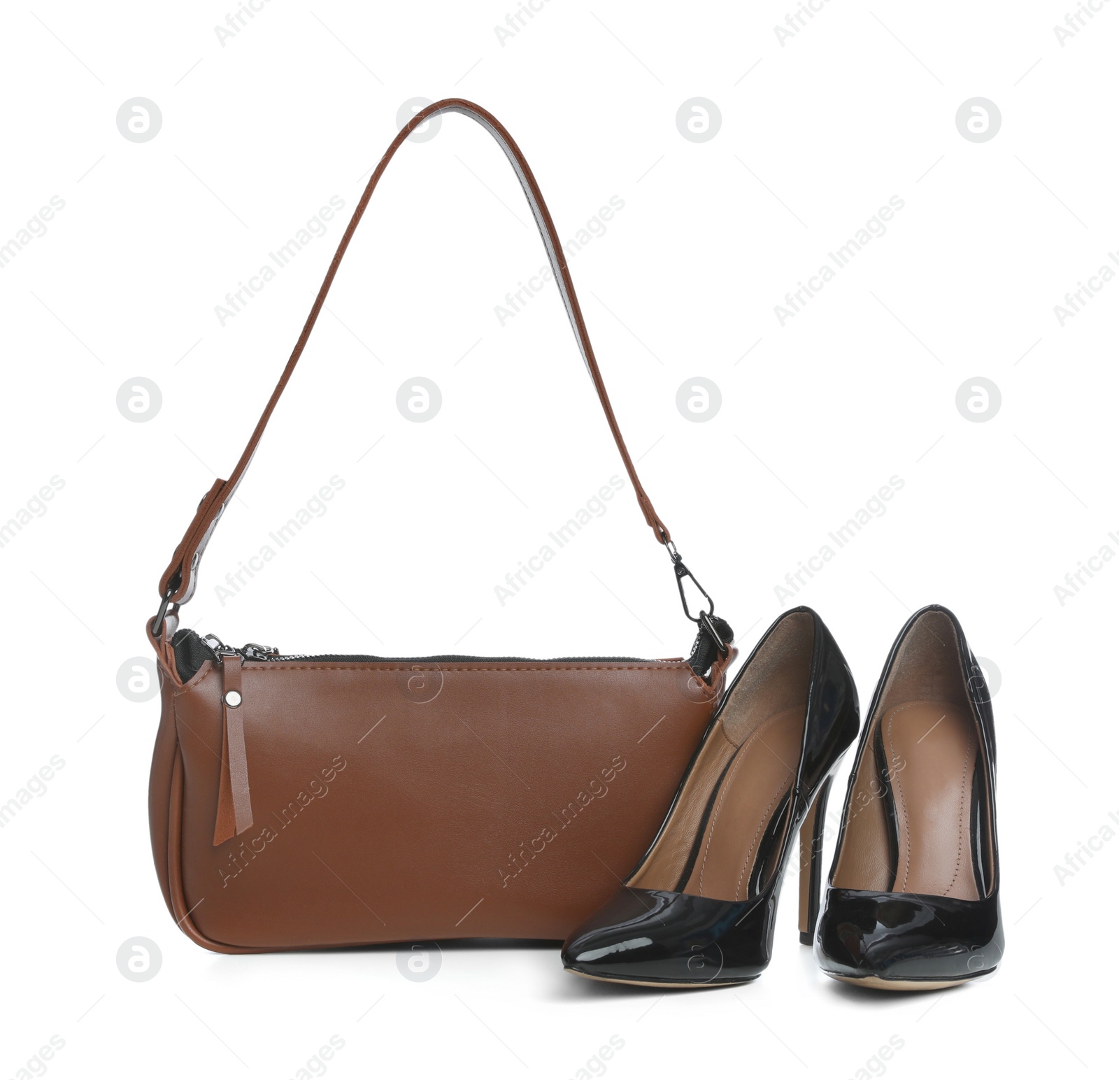 Photo of Stylish woman's bag and shoes isolated on white