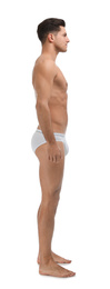 Handsome man in underwear on white background