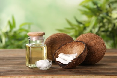 Composition with natural organic coconut oil on wooden table