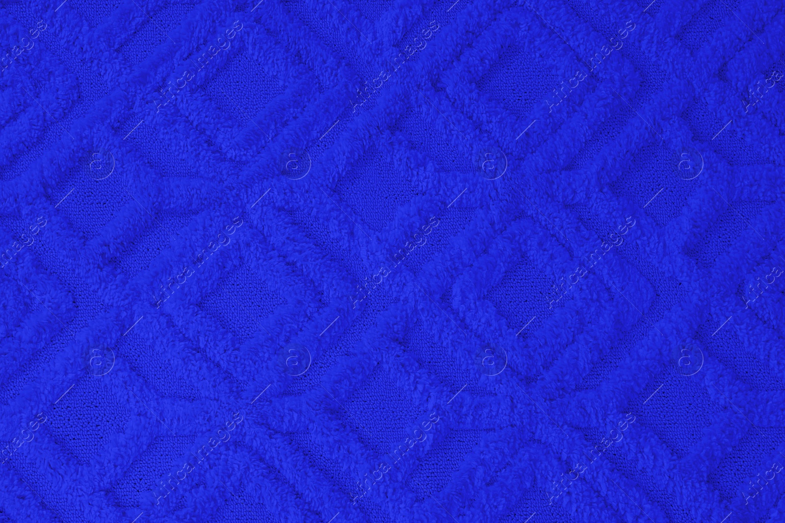 Image of Soft blue carpet with pattern as background, top view