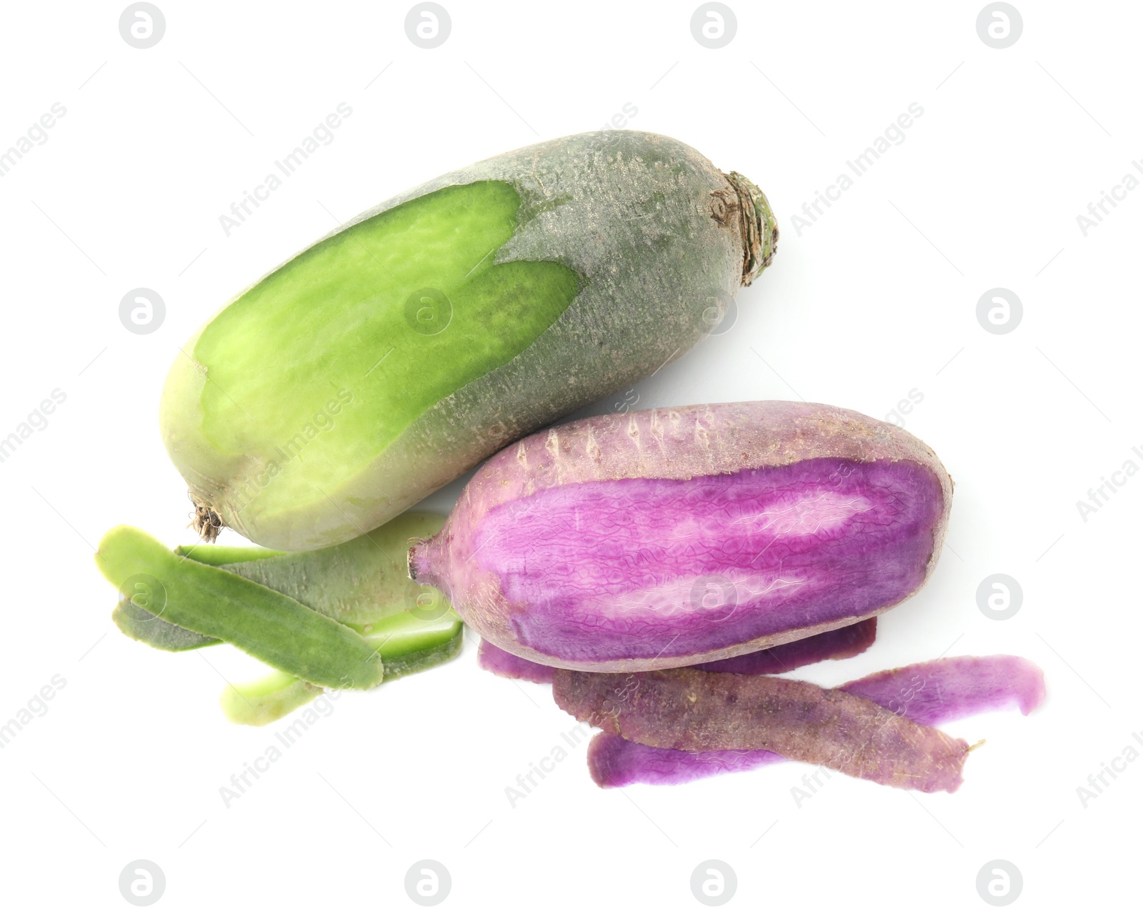 Photo of Purple and green daikon radishes isolated on white, top view