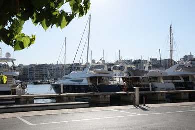 Picturesque view of port with modern boats on sunny day