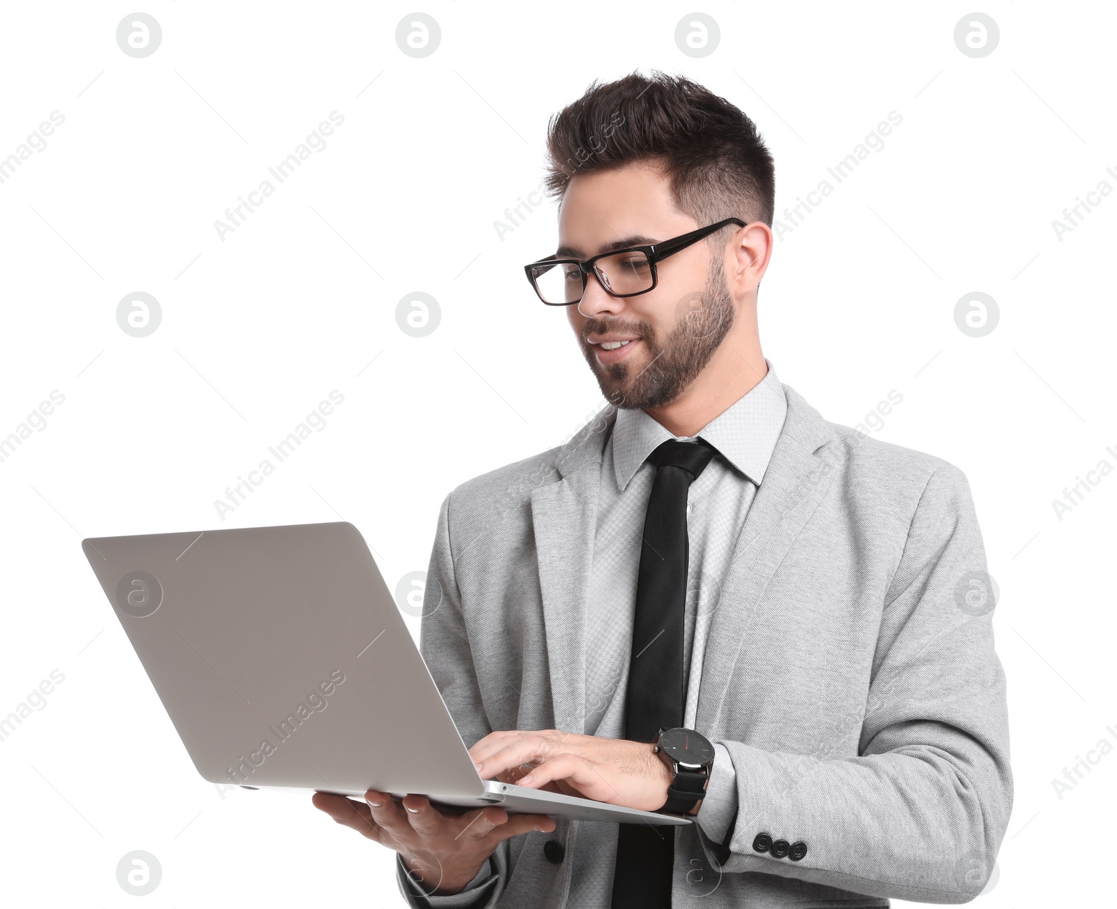 Photo of Young businessman with laptop on white background