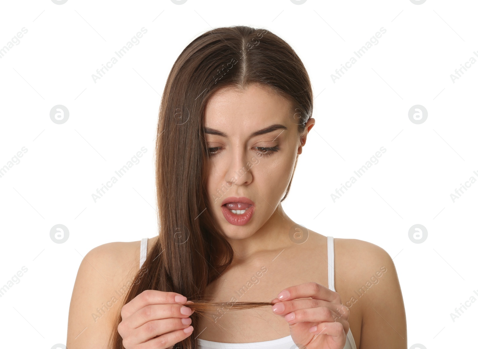 Photo of Emotional woman with damaged hair on white background