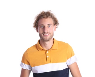 Handsome young man laughing on white background