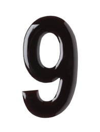 Photo of Chocolate number 9 on white background, top view