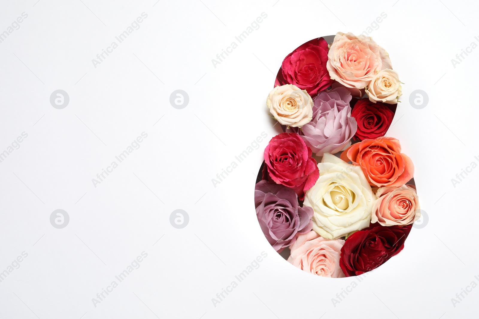 Photo of 8 March greeting card design with roses and space for text, top view. Happy International Women's Day