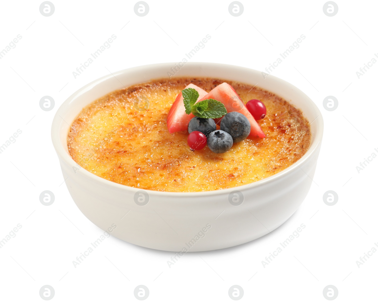 Photo of Delicious creme brulee with fresh berries isolated on white