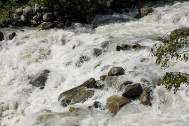 Photo of Closeup view of river stream in mountains