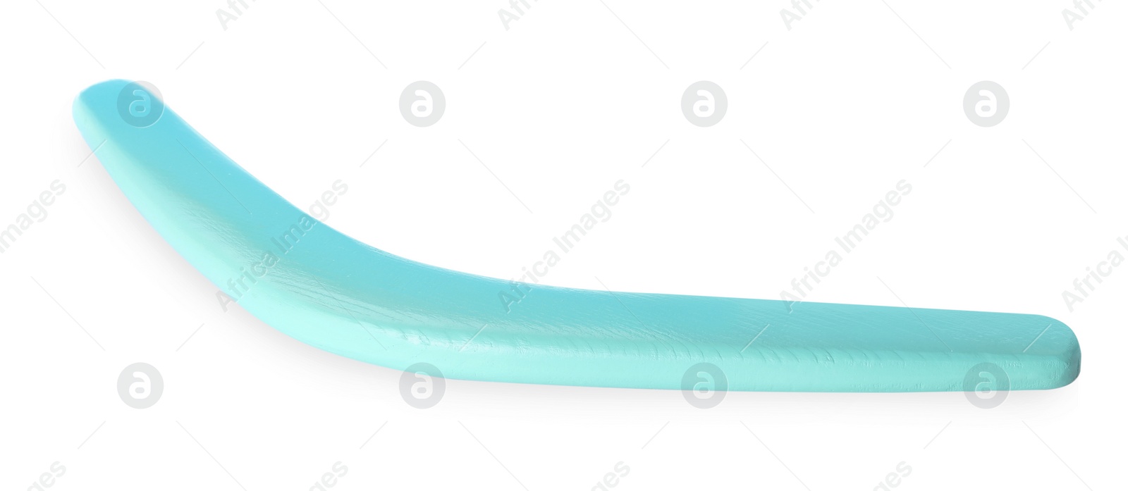 Photo of Turquoise boomerang isolated on white. Outdoors activity