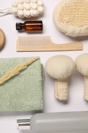 Bath accessories. Different personal care products and dry spikelet on white background, flat lay