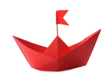 Photo of Handmade red paper boat with flag isolated on white. Origami art