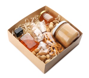 Gift set with different products in box on white background. Stylish present