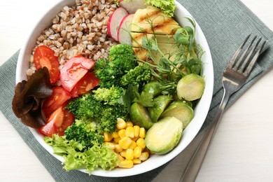 Healthy meal. Tasty products in bowl on white table, top view