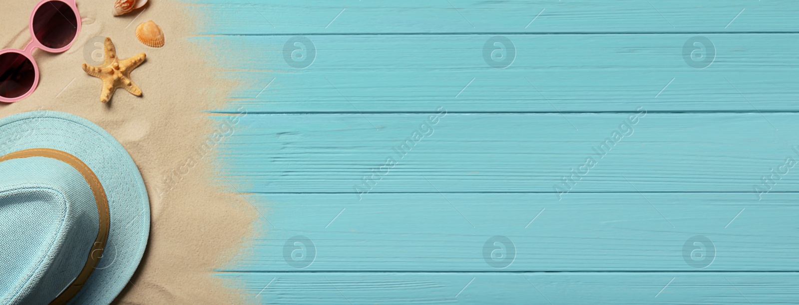 Image of Flat lay composition with beach objects on blue wooden background, space for text. Banner design