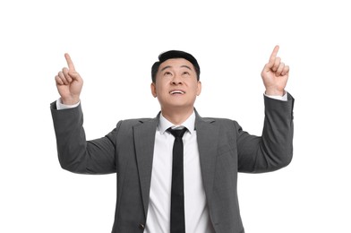 Photo of Businessman in suit pointing at something on white background