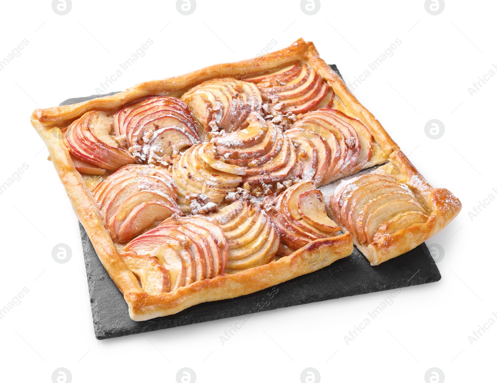 Photo of Freshly baked apple pie with nuts and powdered sugar isolated on white