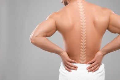 Image of Muscular man on grey background, back view. Illustration of spine