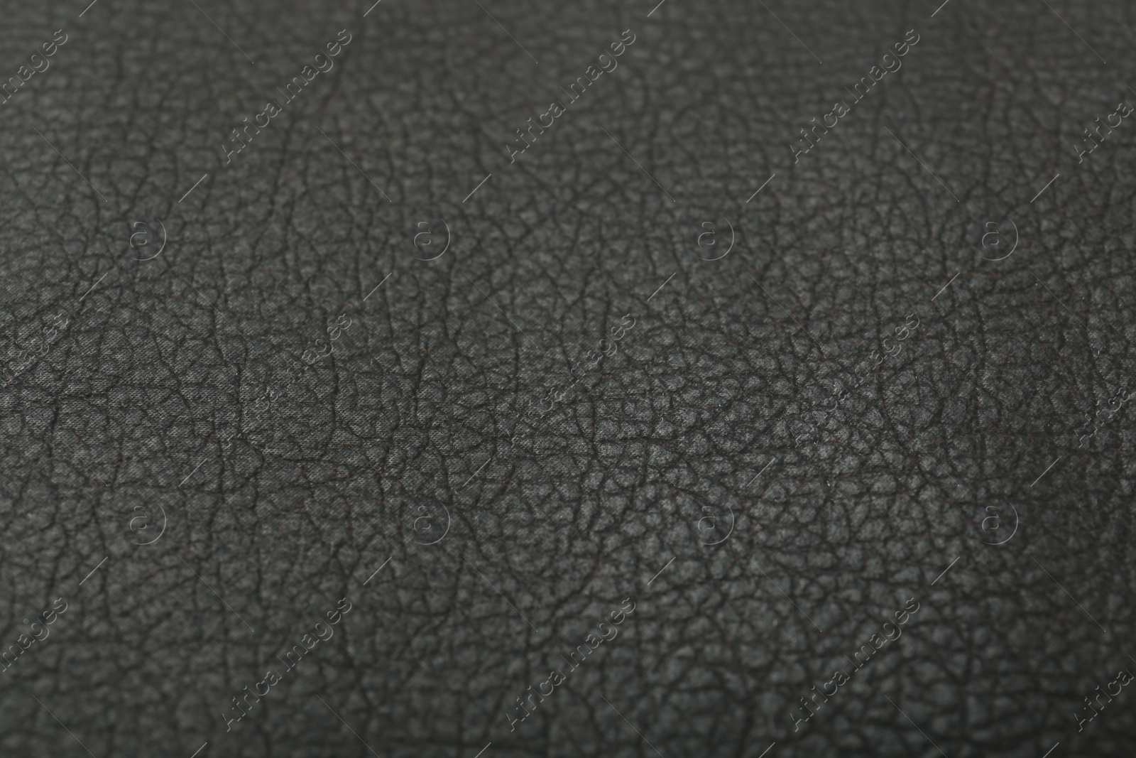 Photo of Black natural leather as background, above view