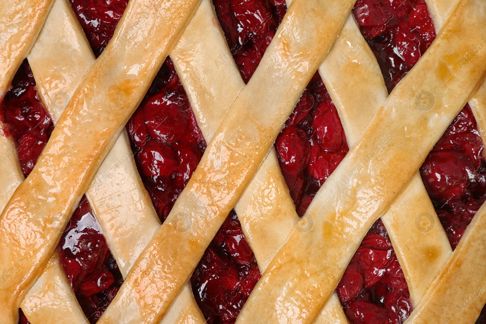 Photo of Delicious fresh cherry pie as background, top view