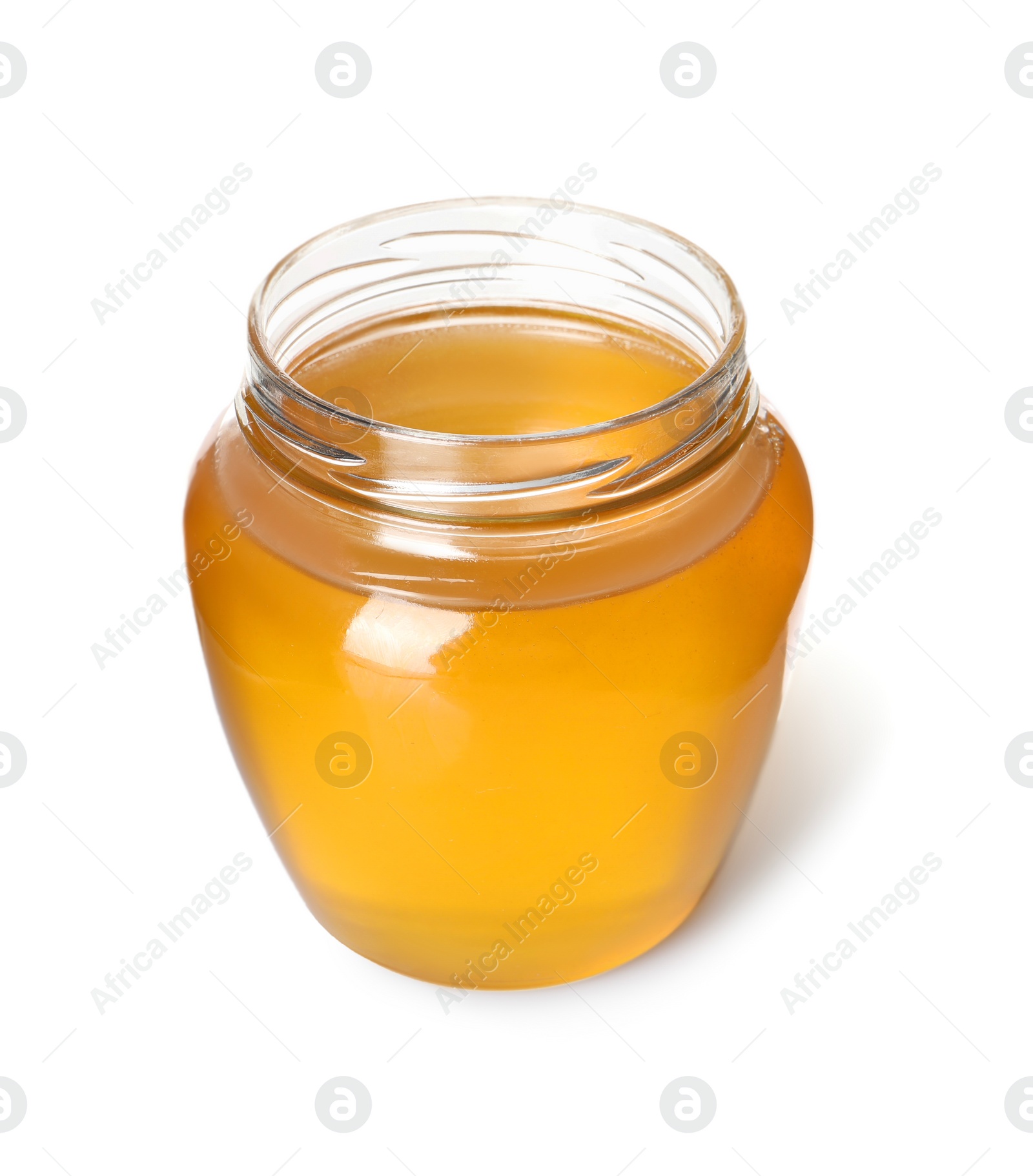 Photo of Tasty honey in glass jar isolated on white