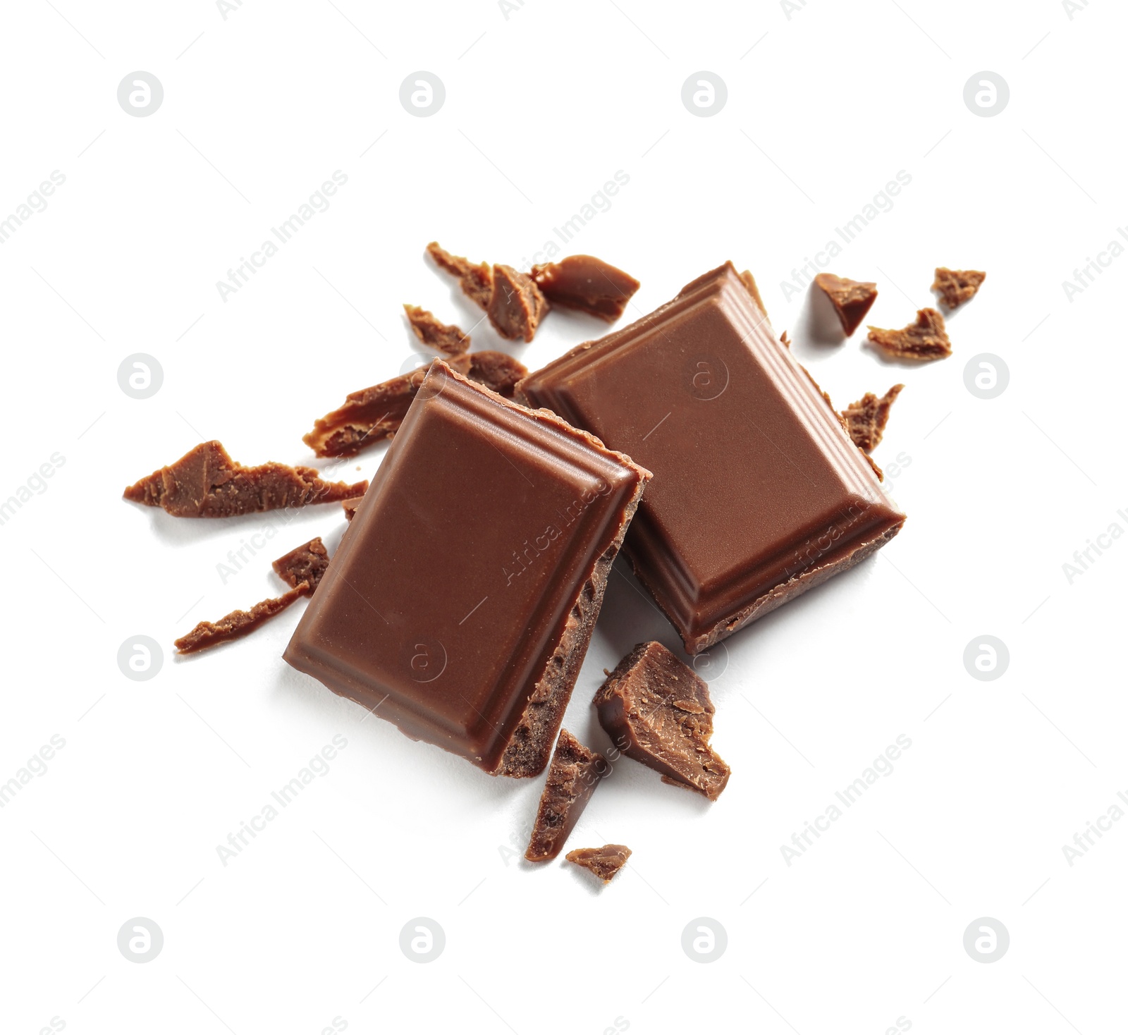 Photo of Pieces of tasty milk chocolate on white background