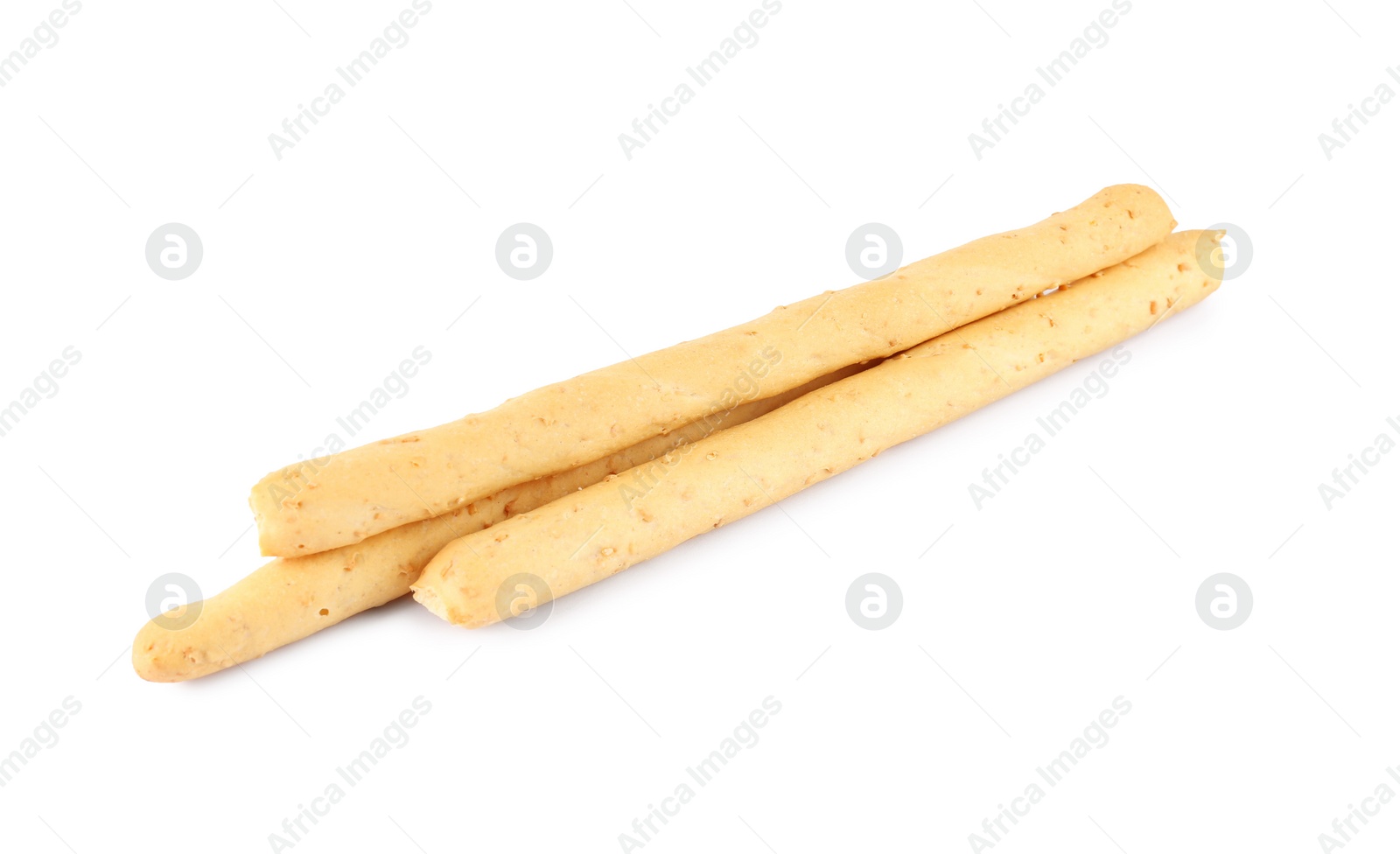 Photo of Delicious grissini isolated on white. Crusty breadsticks