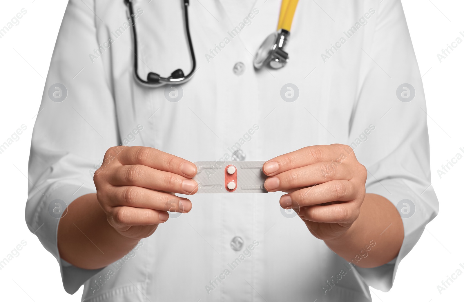 Photo of Doctor holding blister of emergency contraception pills against white background, focus on hands