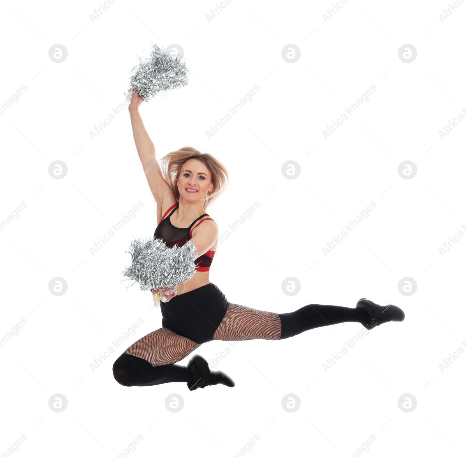 Photo of Beautiful cheerleader with pom poms jumping on white background