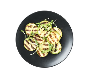 Photo of Delicious grilled zucchini slices and microgreens on white background, top view