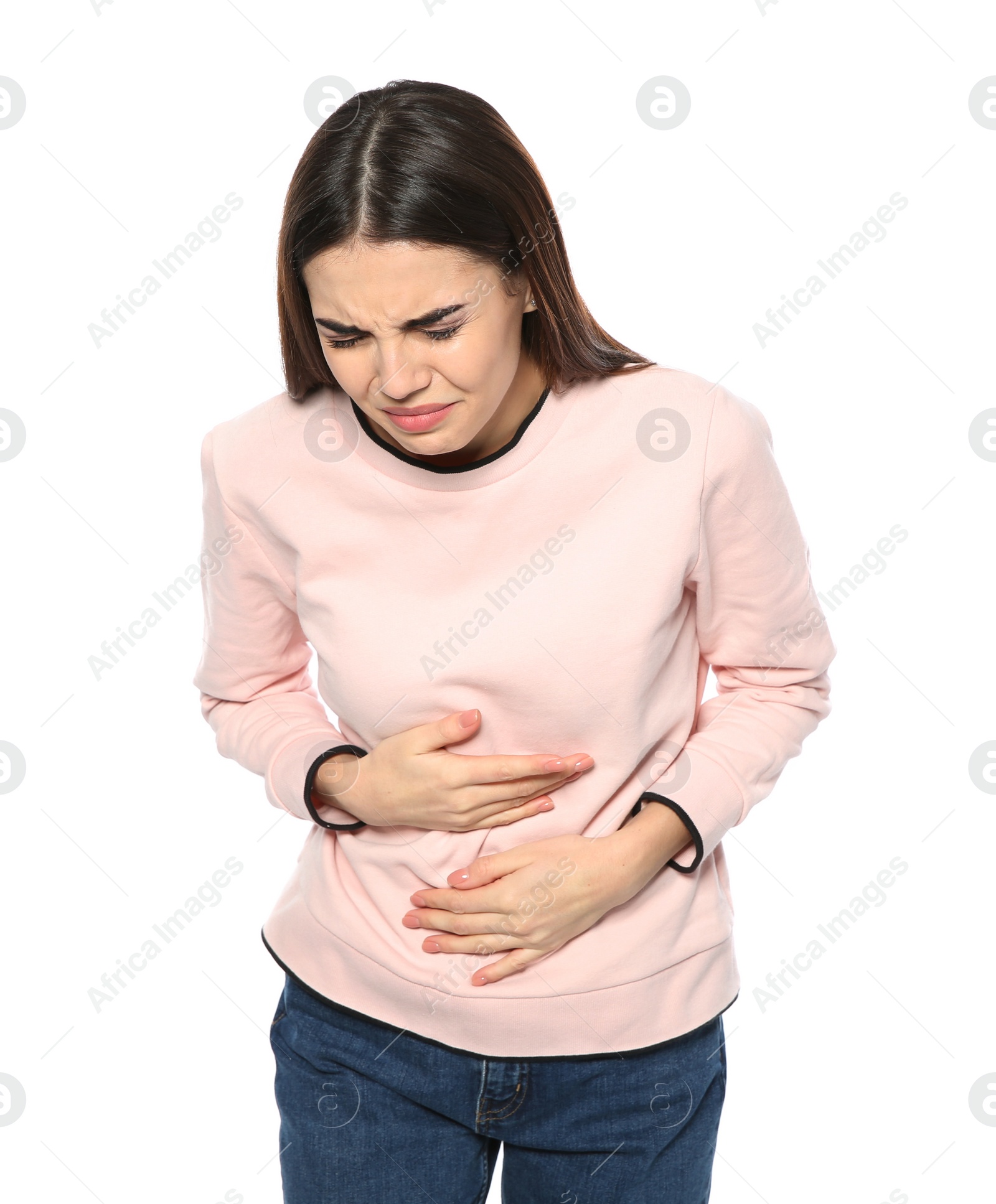 Photo of Young woman suffering from digestive disorder isolated on white