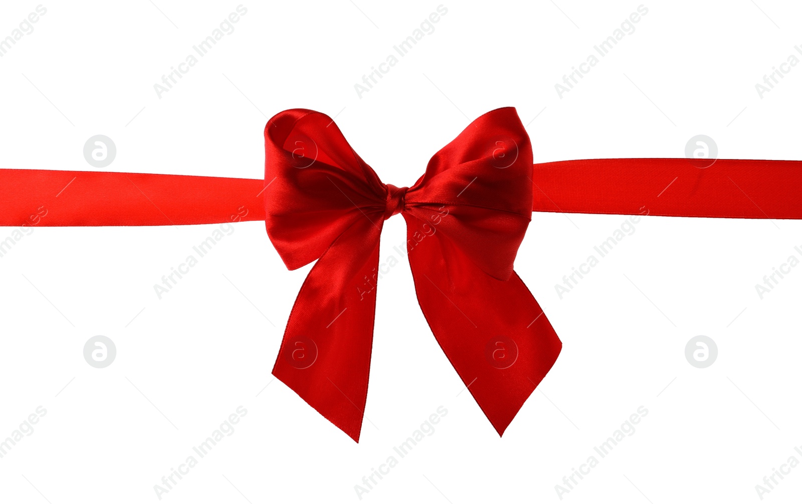 Photo of Red ribbon with bow on white background. Festive decoration