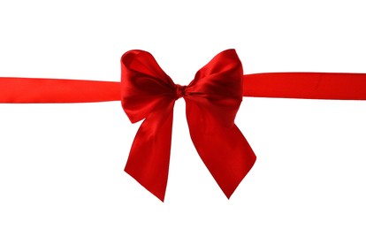 Photo of Red ribbon with bow on white background. Festive decoration