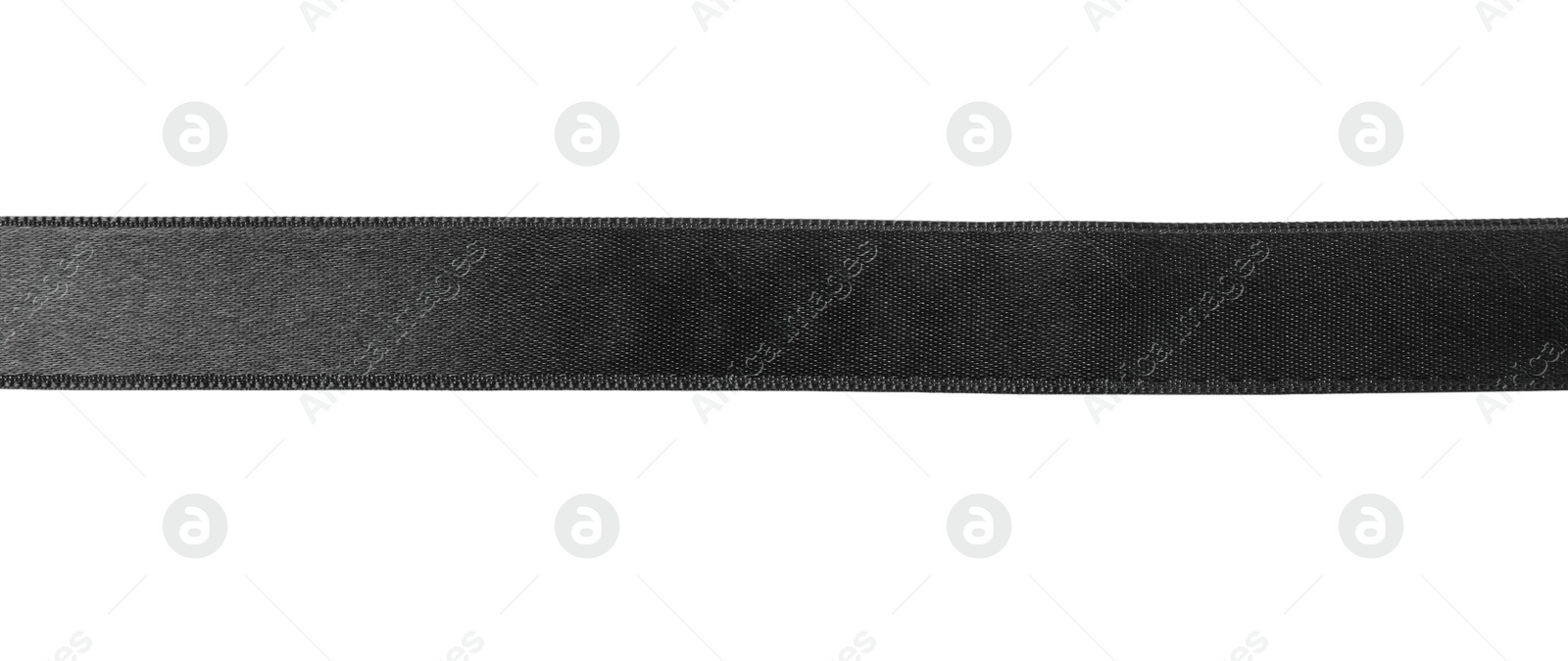 Photo of Black satin ribbon on white background, top view