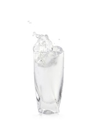 Photo of Shot of vodka with ice and splash isolated on white