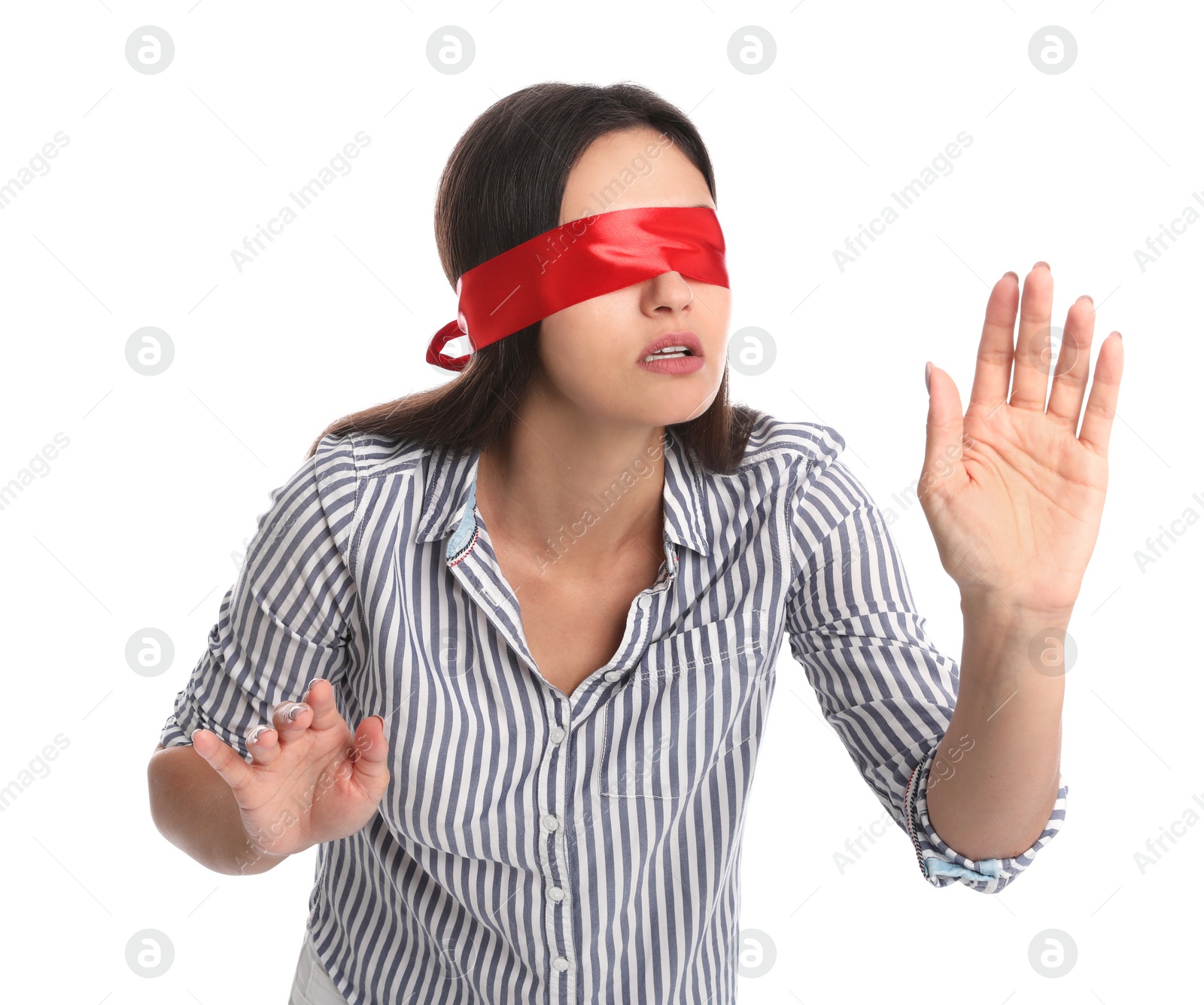 Photo of Young woman wearing red blindfold on white background