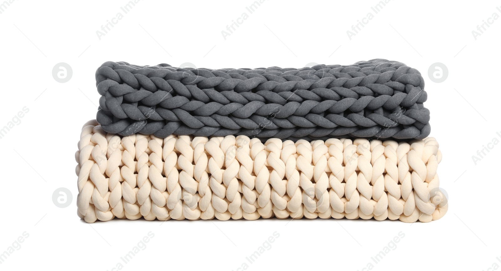 Photo of Knitted merino wool plaids on white background