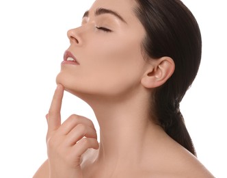 Photo of Young woman massaging her face on white background