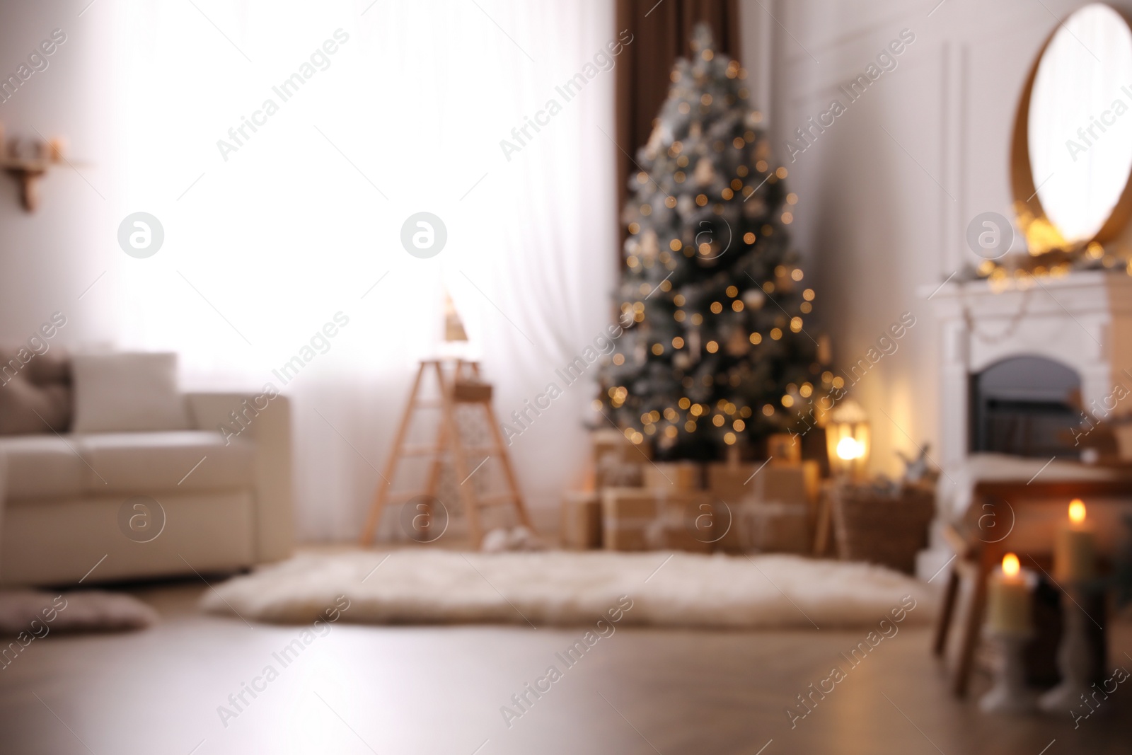 Photo of Blurred view of beautiful room interior with Christmas tree