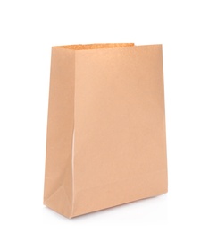 Photo of Paper bag isolated on white. Mockup for design