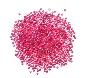 Photo of Pile of pink beads on white background, top view