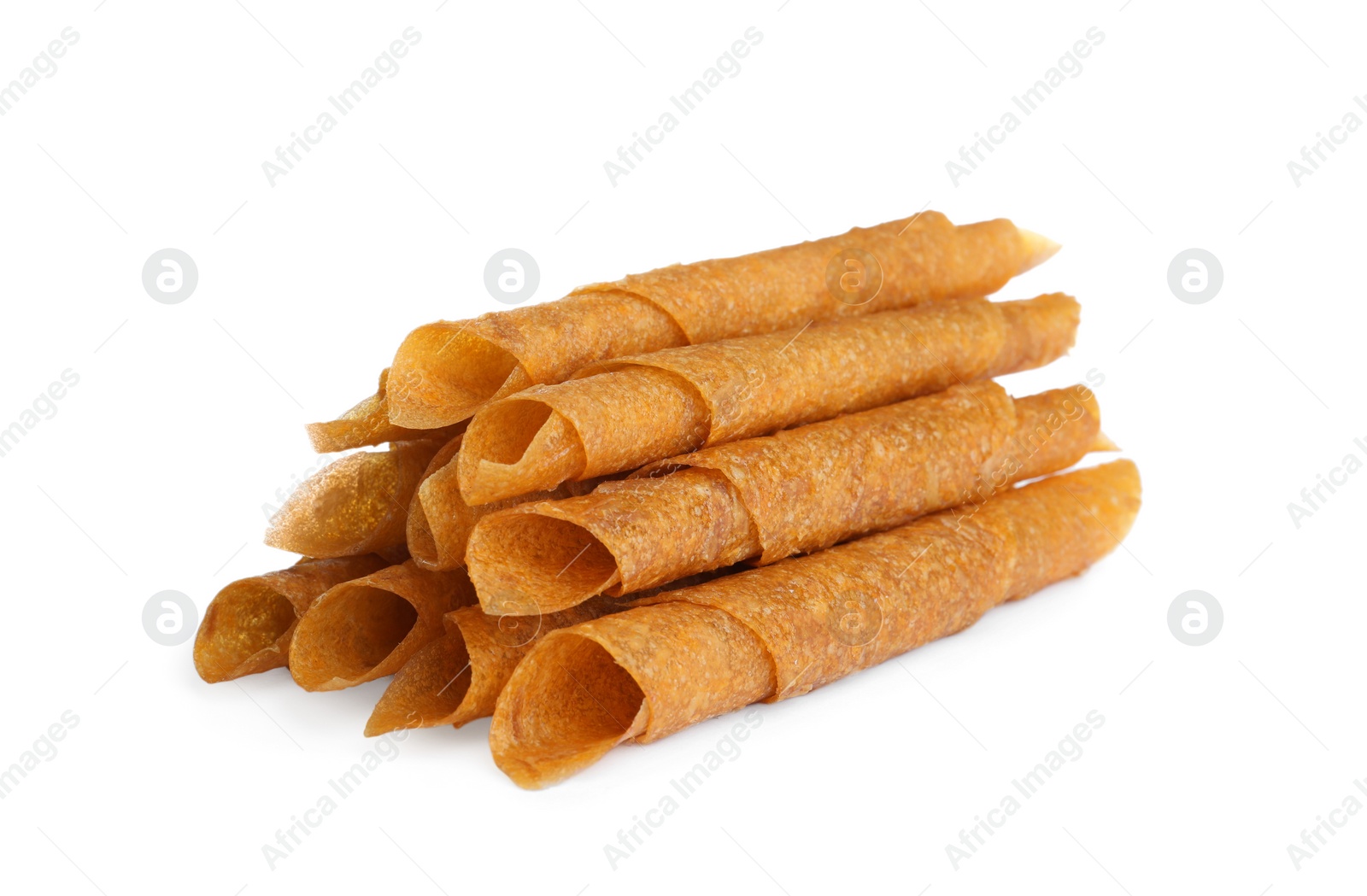 Photo of Delicious fruit leather rolls on white background