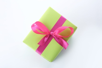 Photo of Beautiful gift box with ribbon on white background