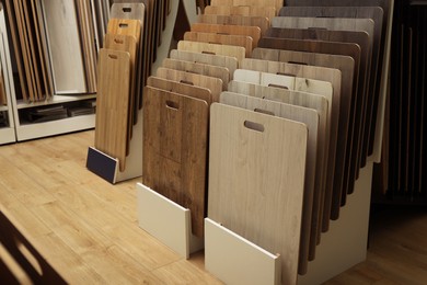 Many different samples of wooden flooring in store