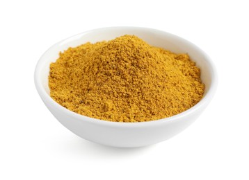 Photo of Dry curry powder in bowl isolated on white