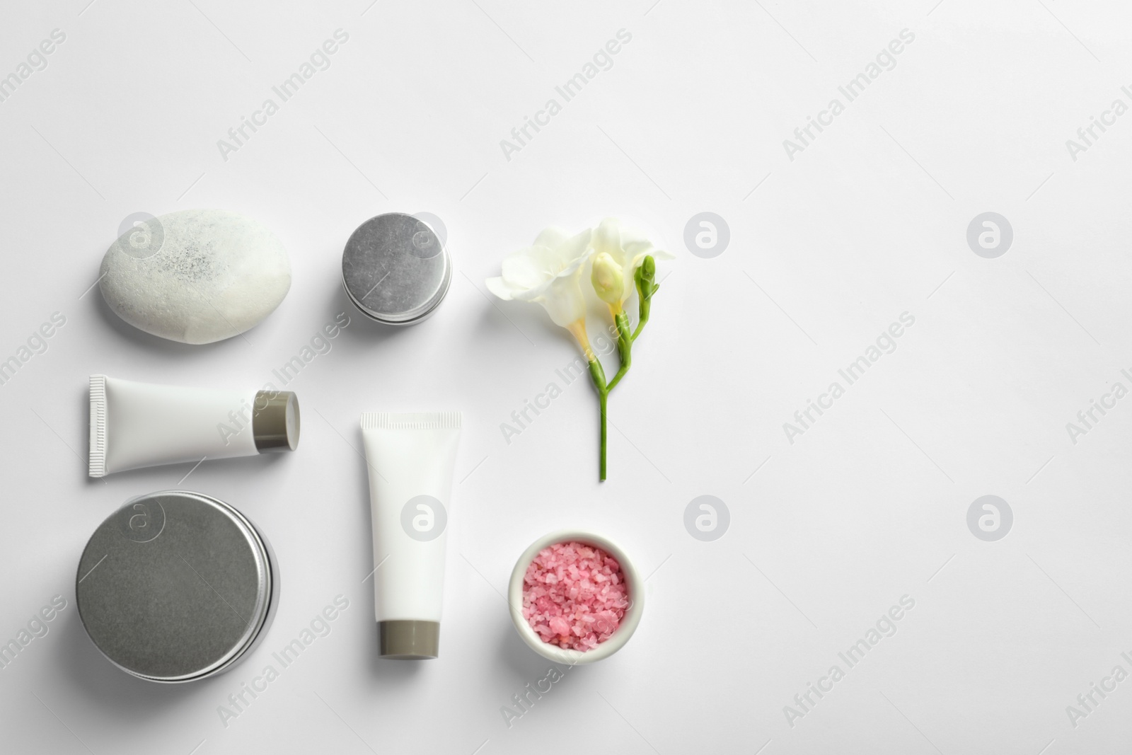 Photo of Flat lay composition with cosmetic products on white background