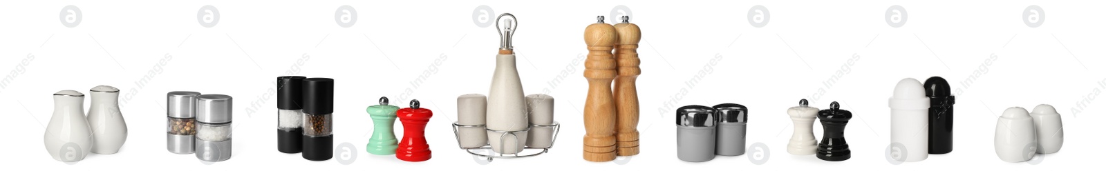 Image of Set with different pepper and salt shakers on white background. Banner design