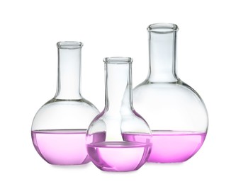 Boiling flask with pink liquid isolated on white. Laboratory glassware